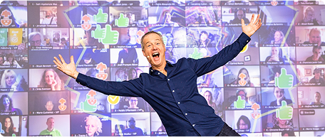 Person celebrating with arms raised, video call grid in background